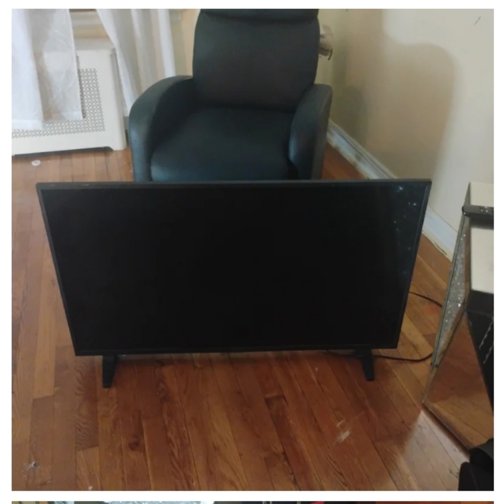 Sleek Black Flat Screen TV